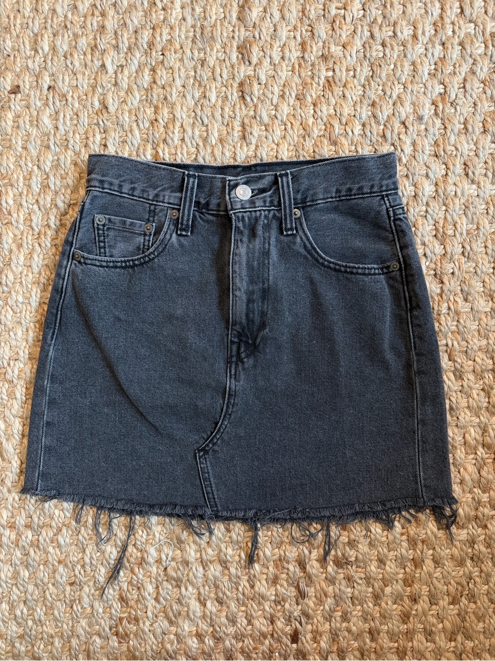 Levi’s Black Denim Mini Skirt with Frayed Hem